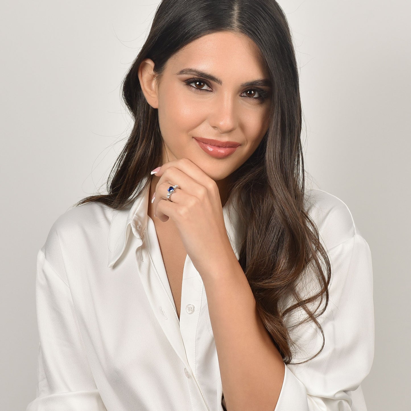 WOMEN'S STEEL RING WITH WHITE CRYSTALS AND BLUE CRYSTAL HEART