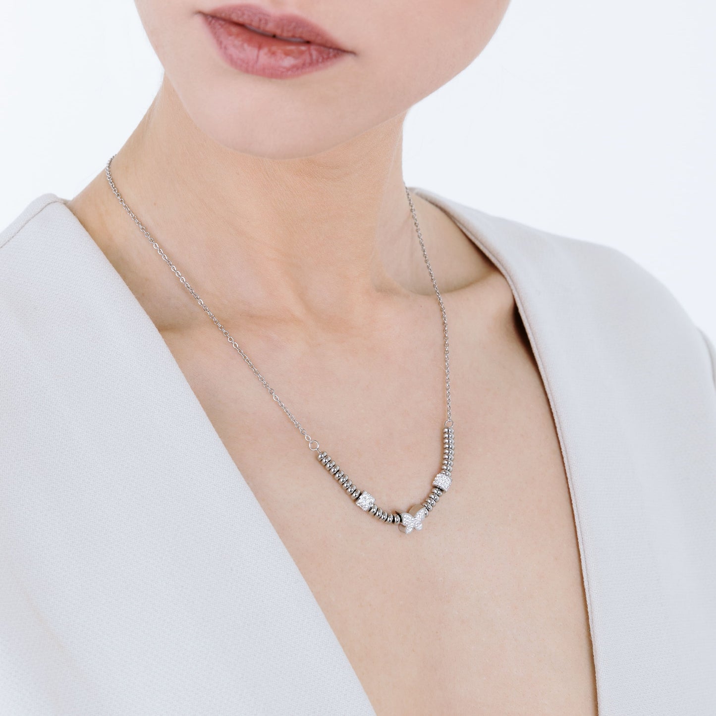 STEEL BUTTERFLY NECKLACE WITH WHITE CRYSTALS