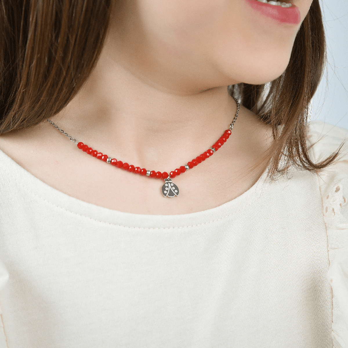 STEEL GIRL NECKLACE WITH RED STONES AND LADYBUG