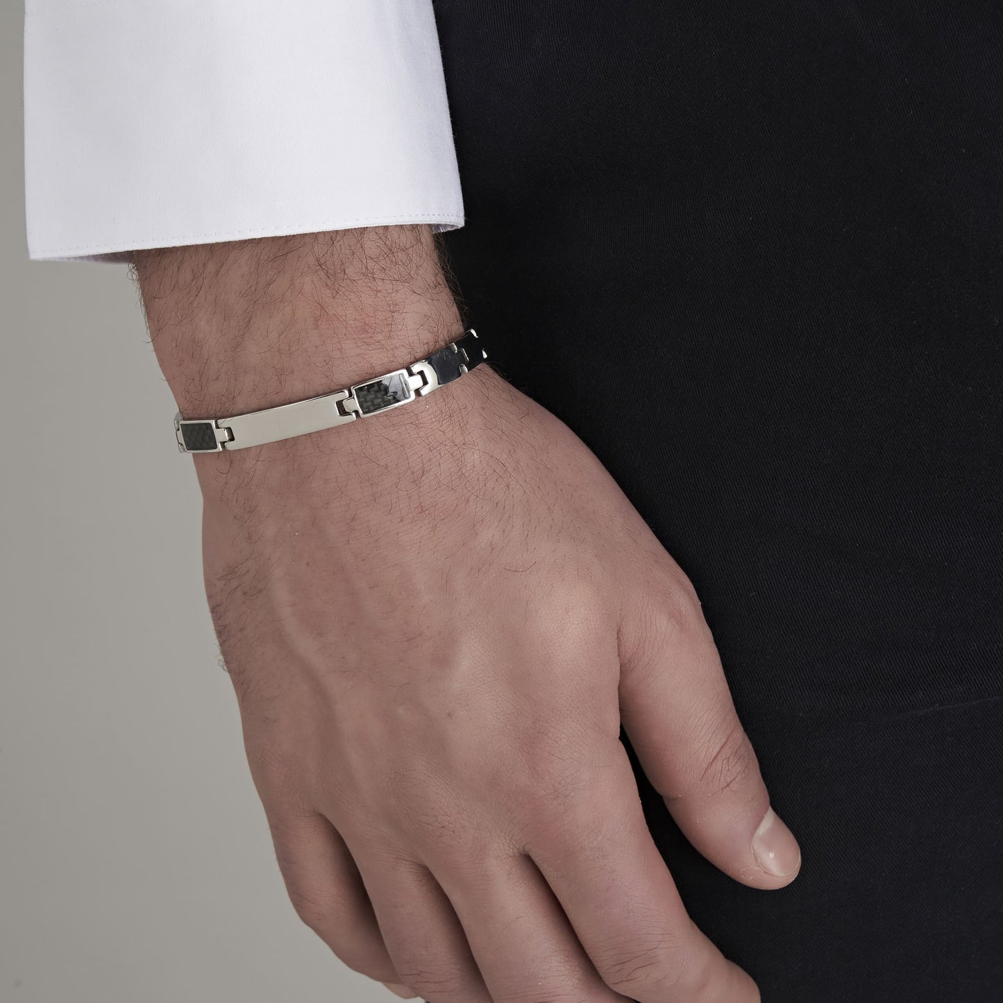 MEN'S BRACELET WITH STEEL PLATE AND BLACK ELEMENTS