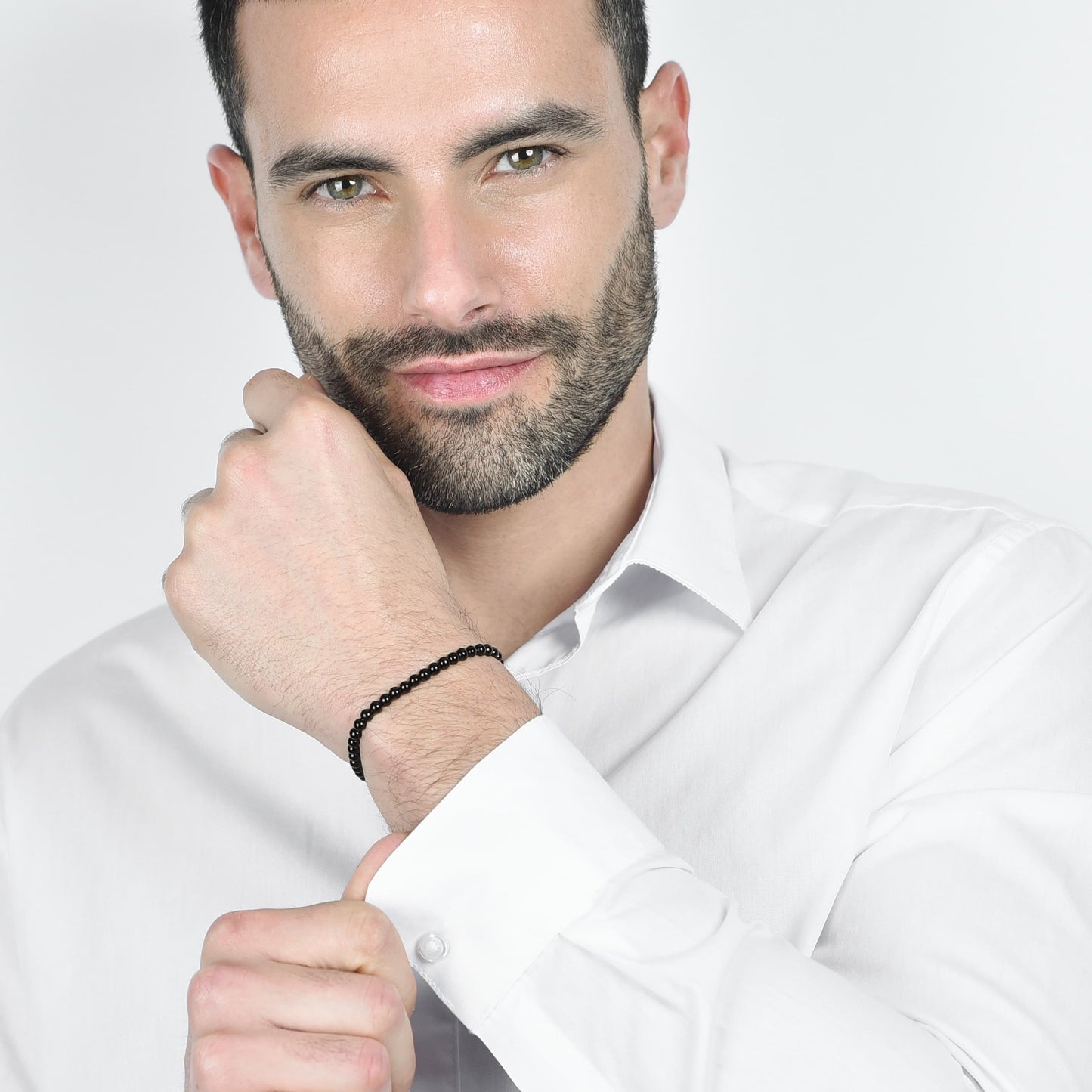 BRACCIALE UOMO IN ACCIAIO CON PERLE SINTETICHE NERE