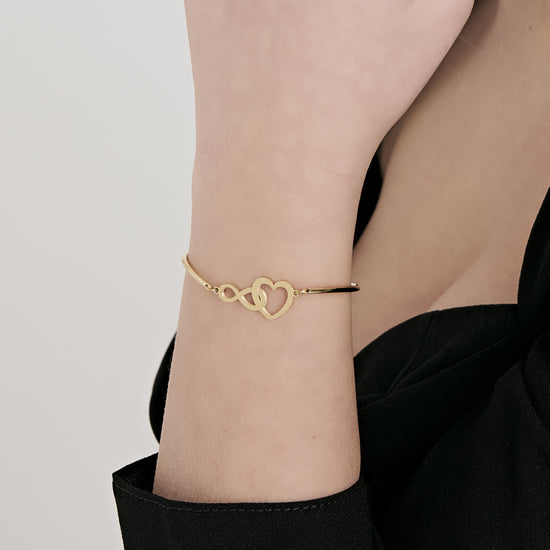 WOMAN'S BRACELET IN IP GOLD STEEL WITH HEART AND INFINITE Luca Barra