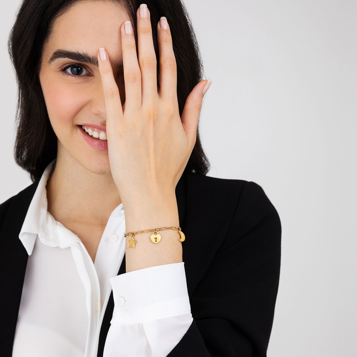 WOMAN'S GOLDEN STEEL BRACELET WITH MOON, HEART LUCKLE AND STAR Luca Barra