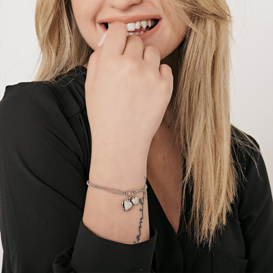 IP GOLD STEEL WOMEN'S BRACELET WITH HEARTS OF DIFFERENT SIZES