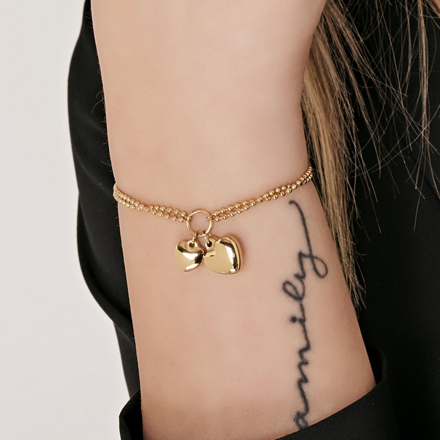 IP GOLD STEEL WOMEN'S BRACELET WITH HEARTS OF DIFFERENT SIZES