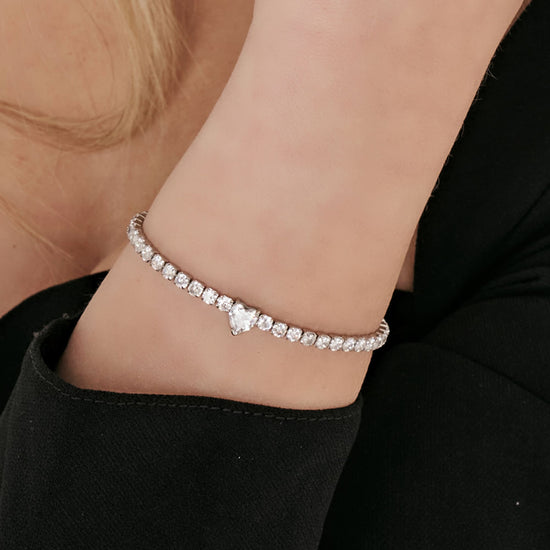 WOMEN'S STEEL BRACELET WITH WHITE CRYSTALS AND CRYSTAL HEART
