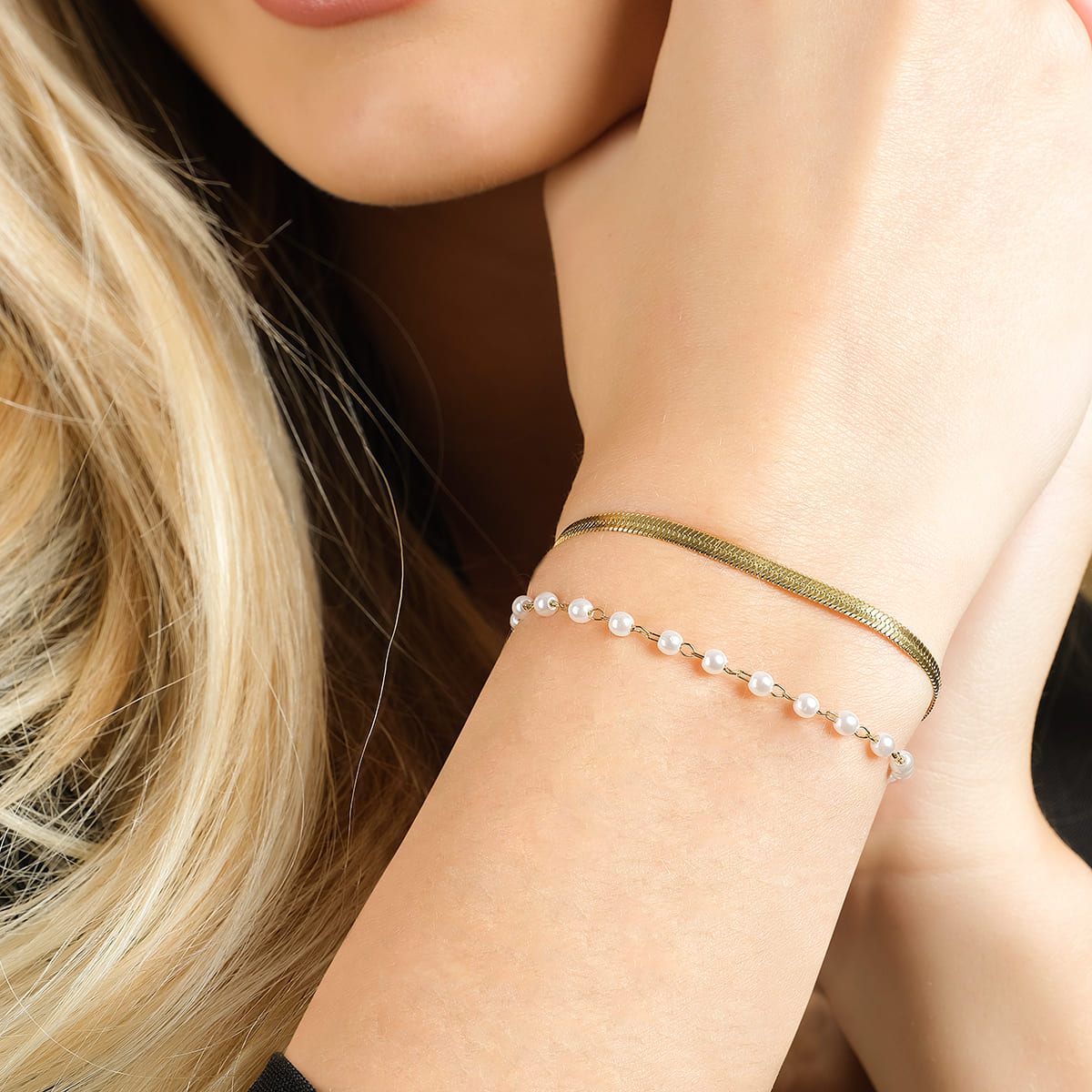 WOMEN'S STEEL BRACELET WITH WHITE PEARLS
