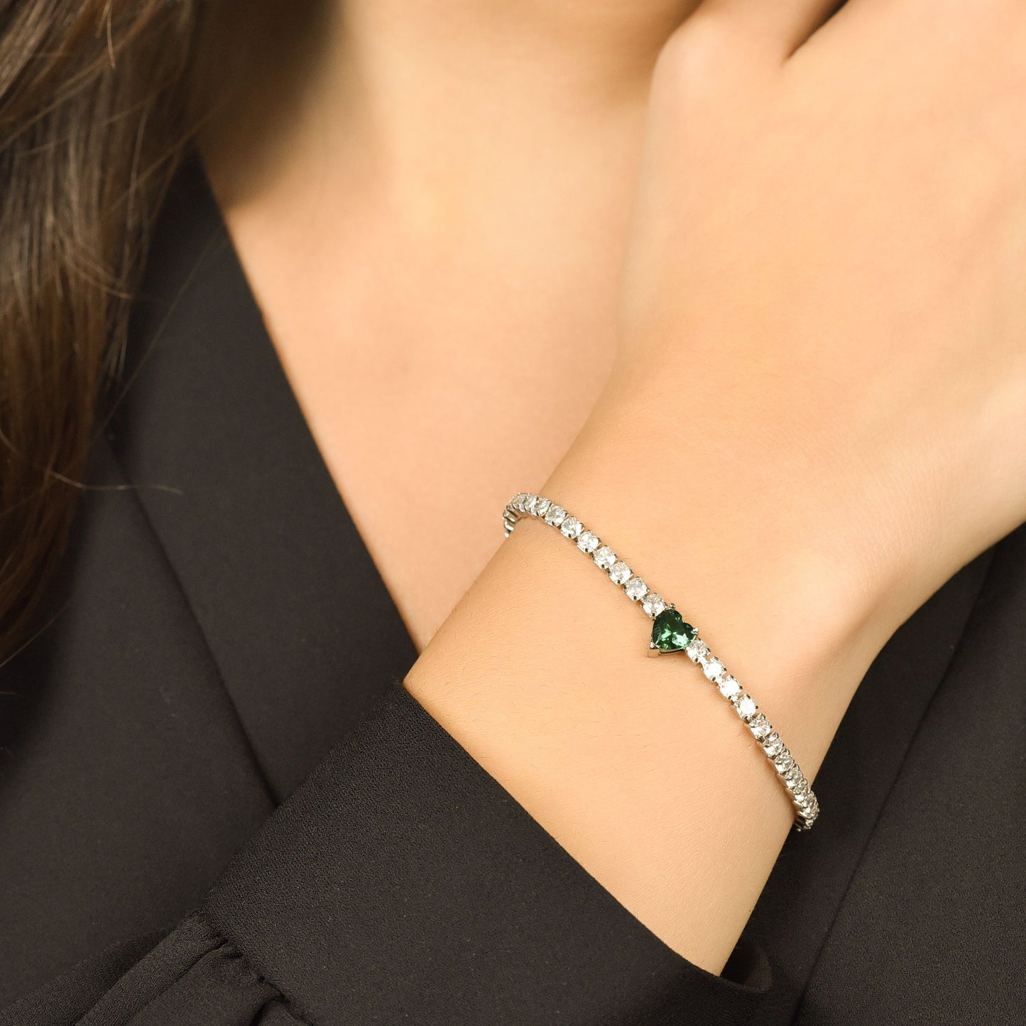 WOMEN'S STEEL TENNIS BRACELET WITH WHITE CRYSTALS AND GREEN CRYSTAL HEART