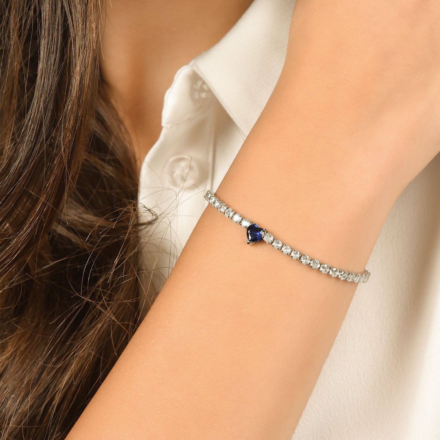 WOMEN'S STEEL TENNIS BRACELET WITH WHITE CRYSTALS AND BLUE CRYSTAL HEART