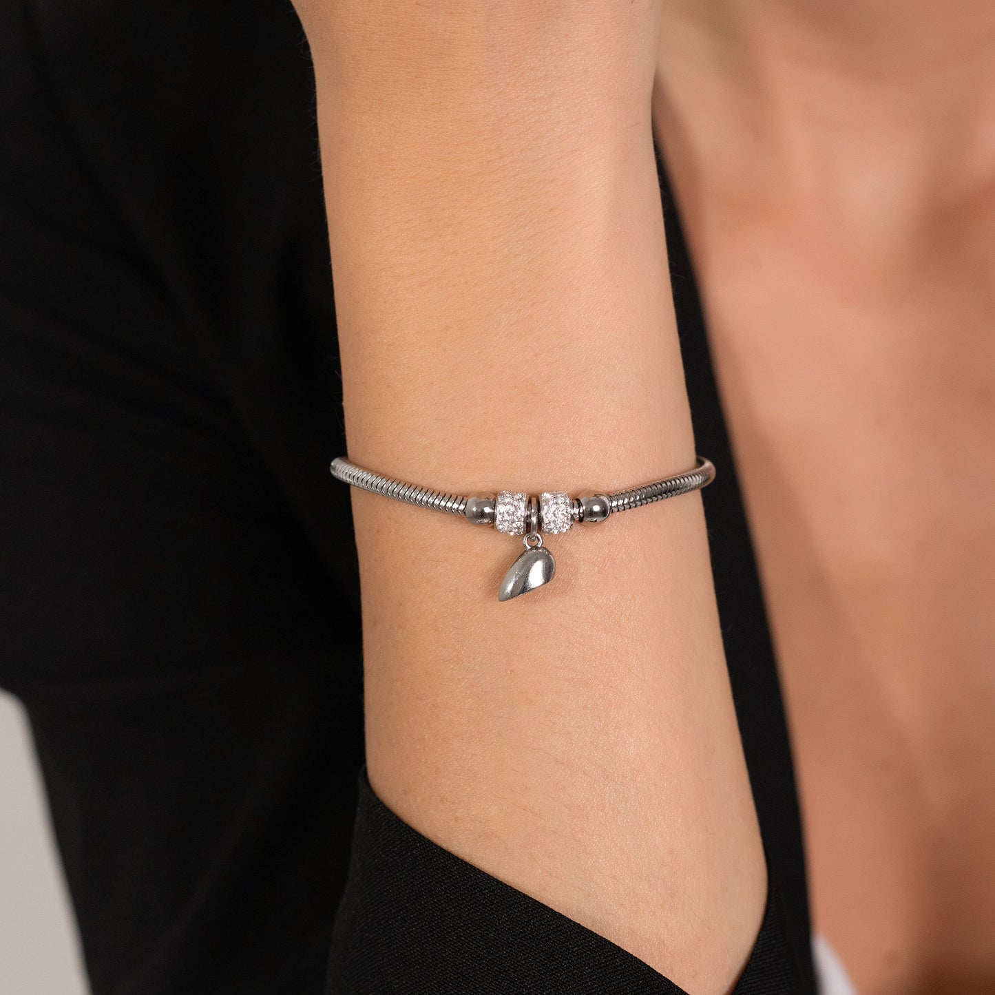 STEEL COUPLE BRACELETS WITH HALF HEART MAGNETIZED