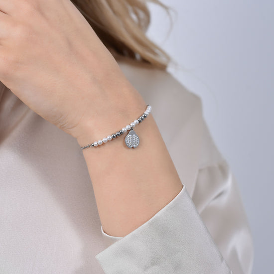 BRACCIALE DONNA IN ACCIAIO CON PERLE SINTETICHE E COCCINELLA