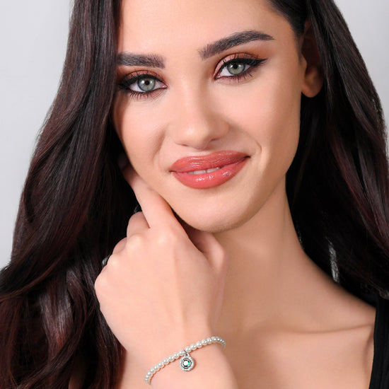 BRACCIALE DONNA IN ACCIAIO PERLE SINTETICHE E ZIRCONE VERDE