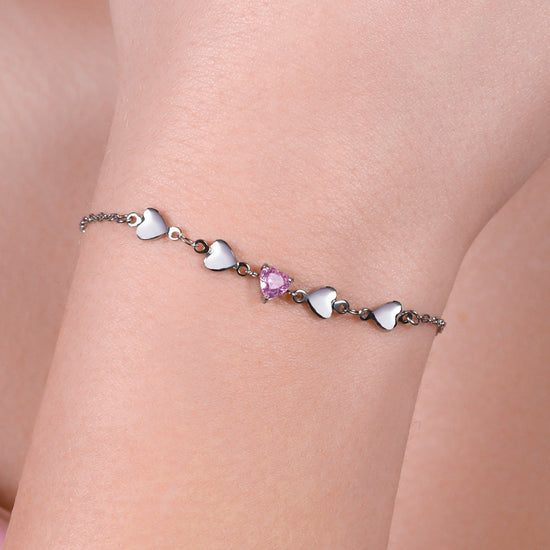 Carica immagine nella Galleria BRACCIALE DONNA IN ACCIAIO CON CUORI E ZIRCONE ROSA
