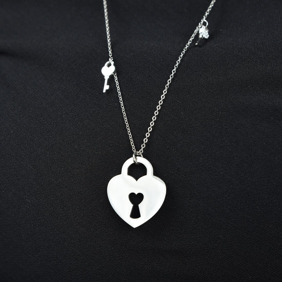 STEEL NECKLACE WITH HEART LUCKLE WITH KEYS Luca Barra