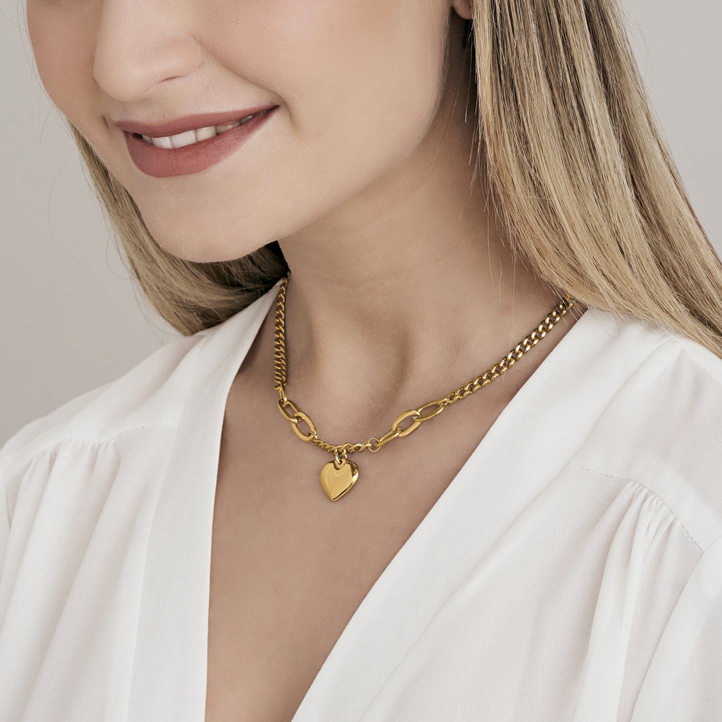 WOMAN'S NECKLACE IN IP GOLD STEEL WITH DENDING HEART Luca Barra