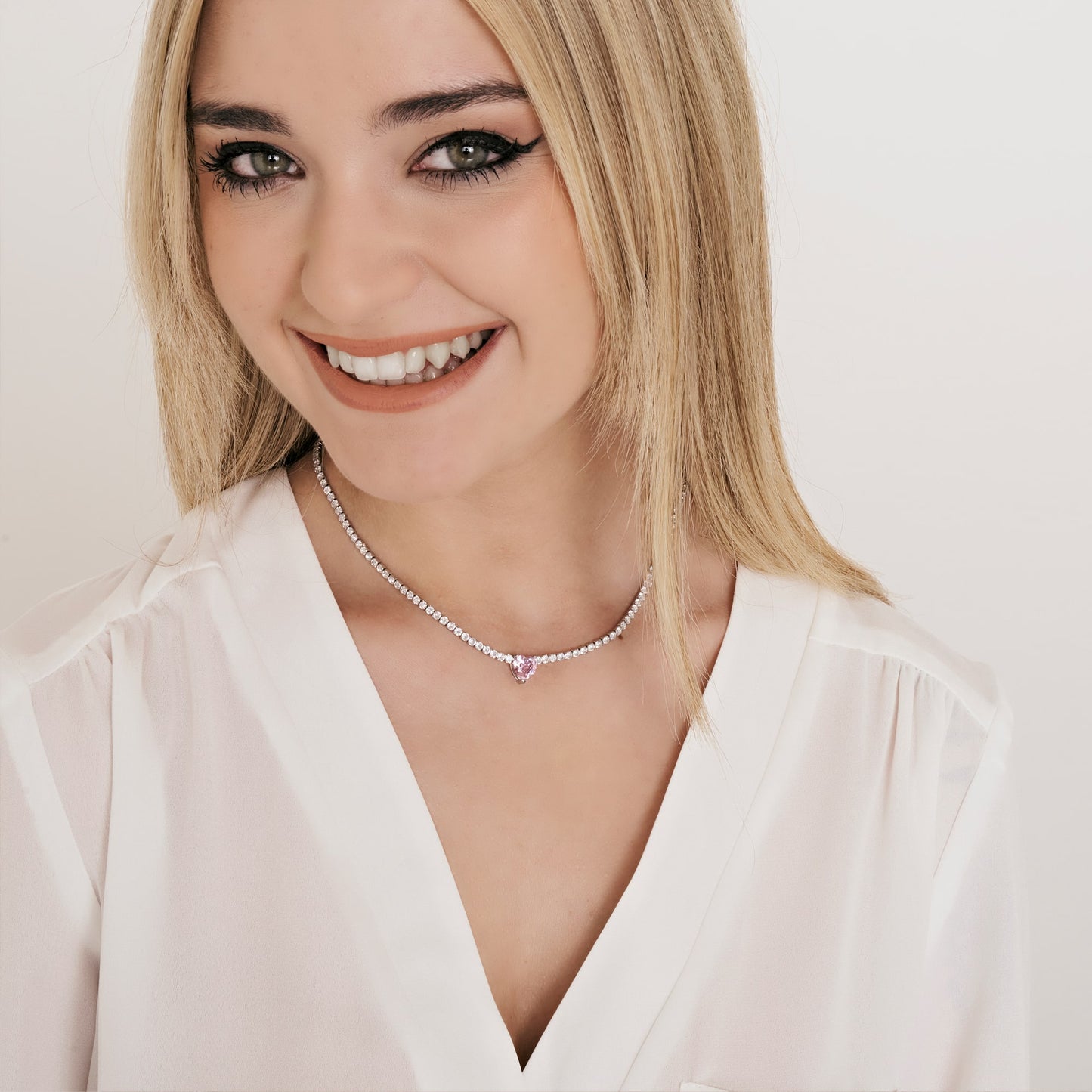 WOMEN'S STEEL NECKLACE WITH WHITE CRYSTALS AND CRYSTAL HEART