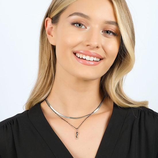 STEEL WOMEN'S NECKLACE WITH HORN AND BLACK ELEMENTS