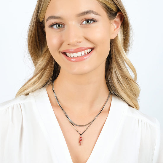 STEEL WOMEN'S HORN NECKLACE WITH RED ENAMEL AND BLACK ELEMENTS