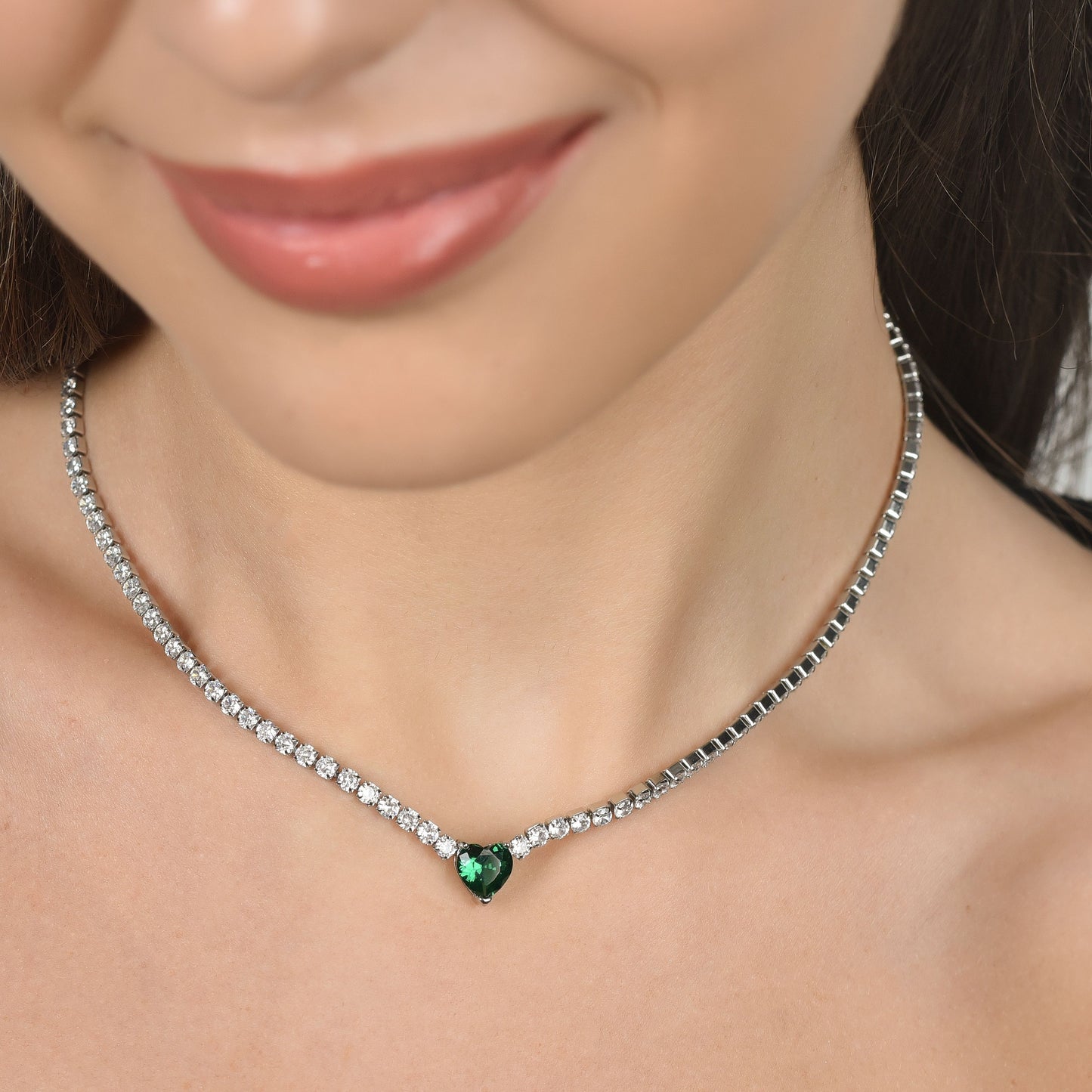 WOMAN'S TENNIS NECKLACE IN STEEL WITH WHITE CRYSTALS AND GREEN CRYSTAL HEART Luca Barra