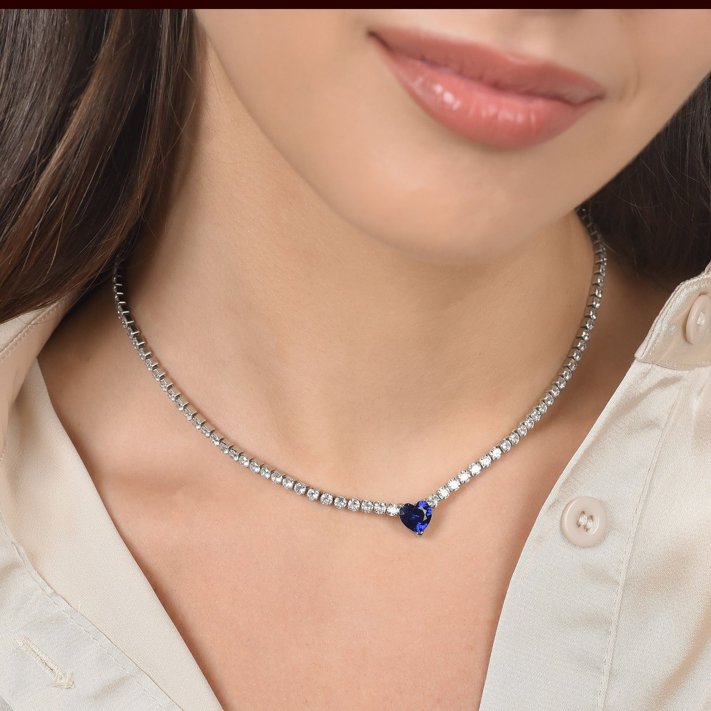 WOMAN'S TENNIS NECKLACE IN STEEL WITH WHITE CRYSTALS AND BLUE CRYSTAL HEART Luca Barra