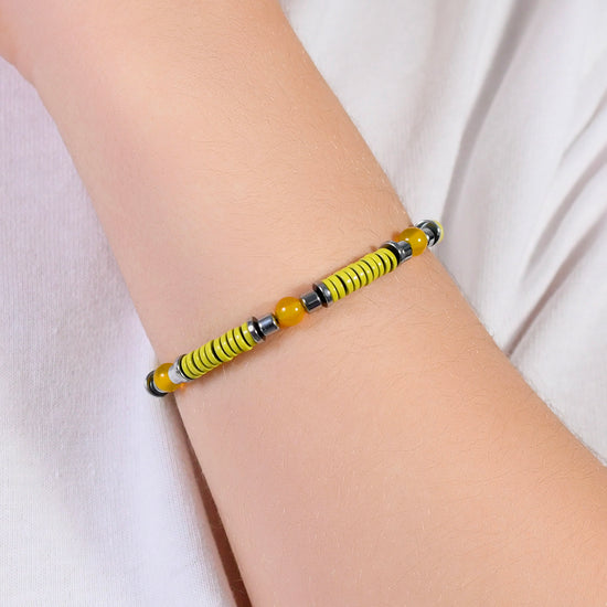 CHILD'S BRACELET IN STEEL WITH YELLOW STONES AND ELEMENTS WITH YELLOW ENAMEL Luca Barra