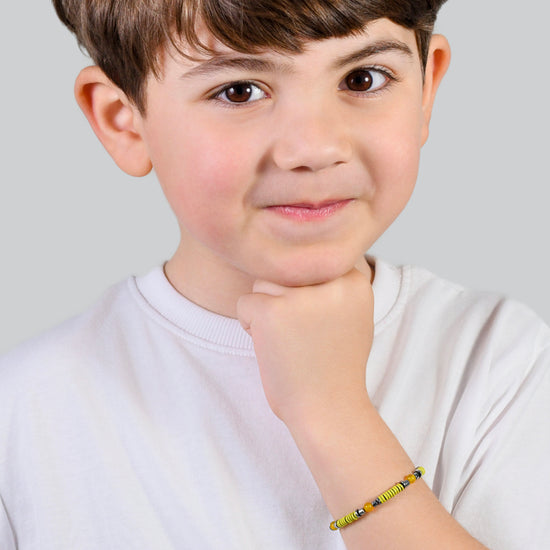 CHILD'S BRACELET IN STEEL WITH YELLOW STONES AND ELEMENTS WITH YELLOW ENAMEL Luca Barra