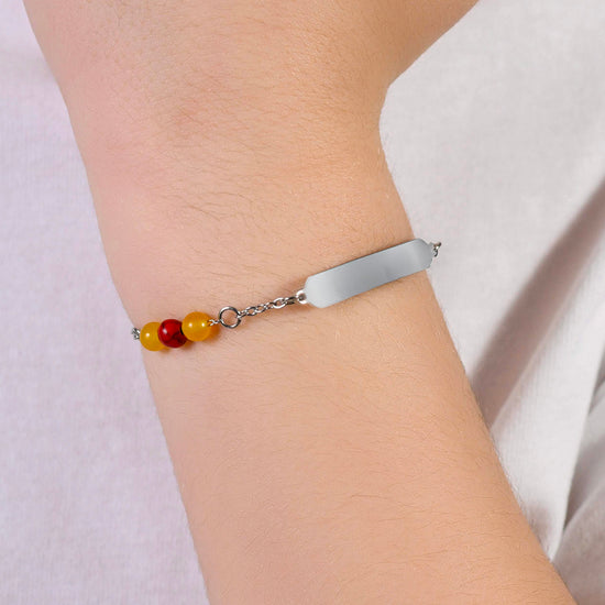 CHILD'S BRACELET IN STEEL WITH YELLOW AND RED STONES Luca Barra