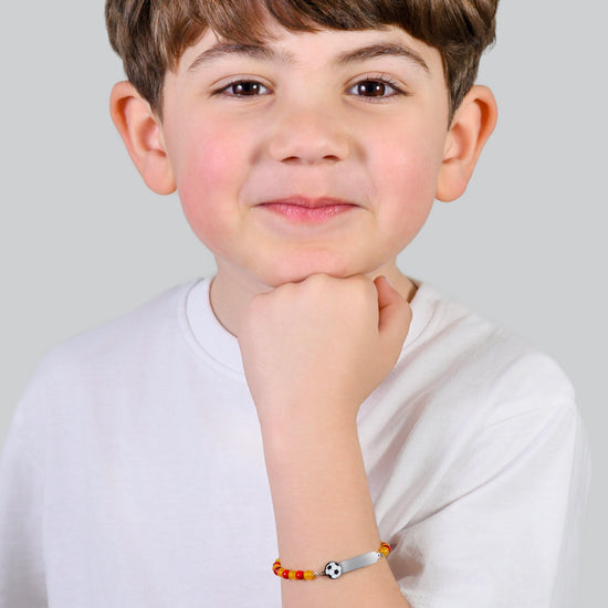 STEEL BABY BRACELET WITH RED AND YELLOW STONES
