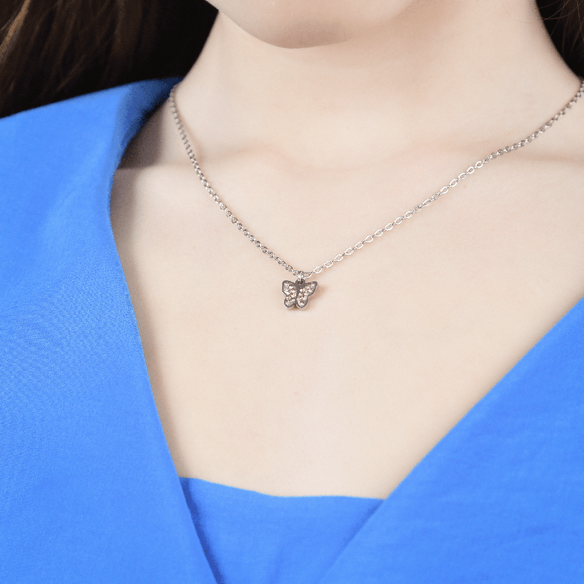 STEEL GIRL NECKLACE WITH BUTTERFLY AND PINK CRYSTALS